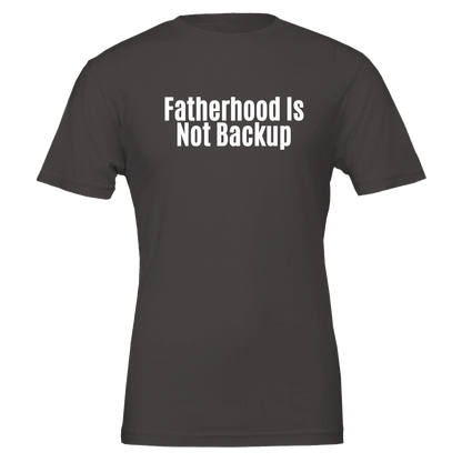 Flat lay of the “Fatherhood Is Not Backup” t-shirt in Vintage Black, front view.