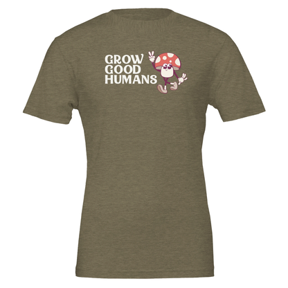 Flat lay of the “Grow Good Humans” t-shirt in Heather Military Green with peace-sign mushroom graphic, front view.