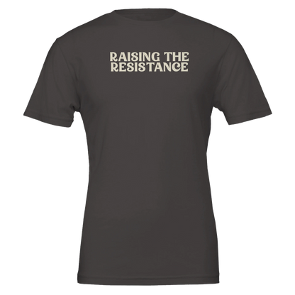 Flat lay of the “Raising the Resistance” t-shirt in Vintage Black with bold cream lettering, front view.