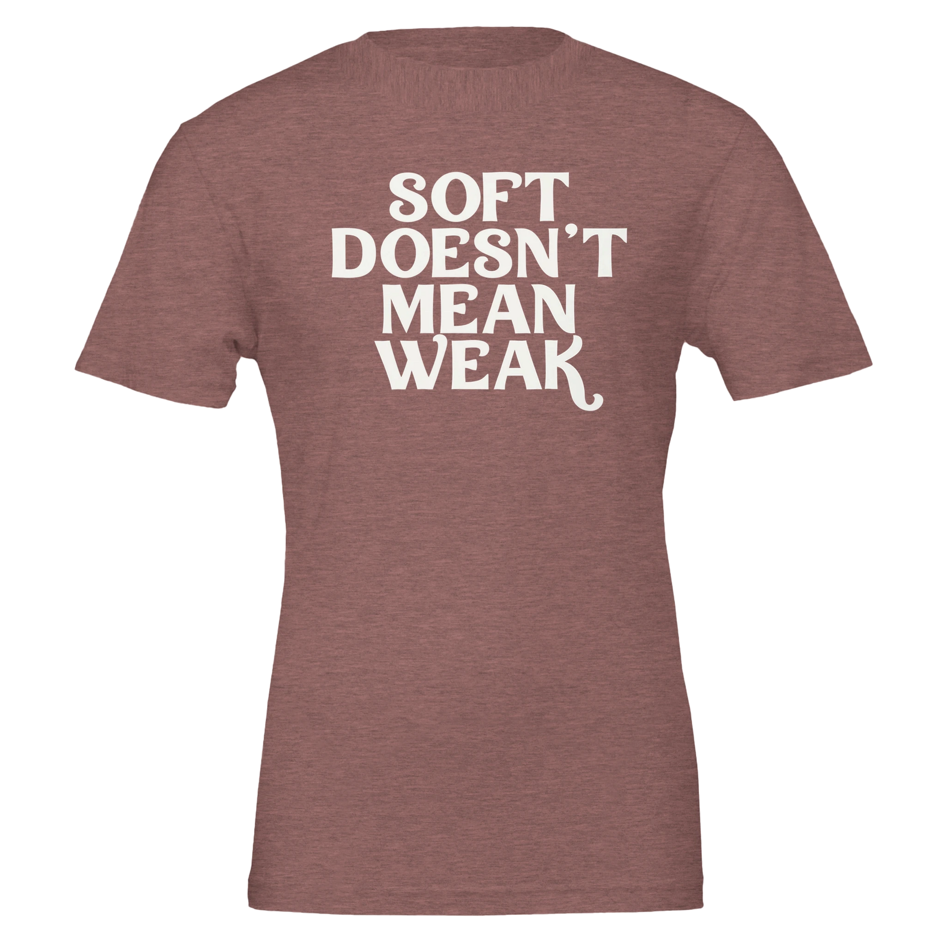 Flat lay of heather mauve t-shirt with white retro-style lettering saying “Soft Doesn’t Mean Weak.”