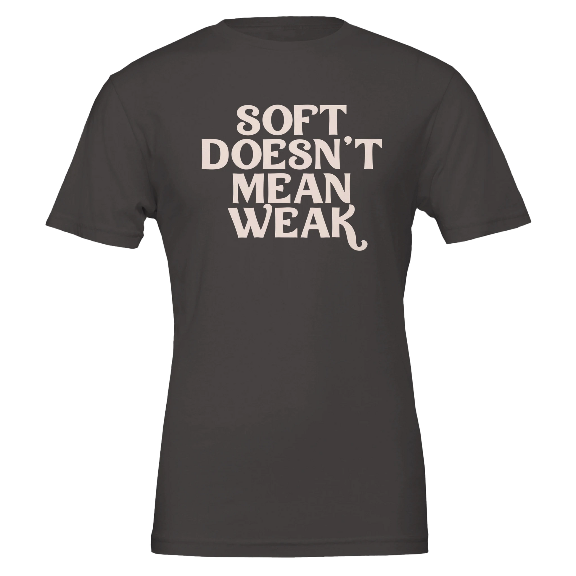 Flat lay of vintage black t-shirt with soft pink text reading “Soft Doesn’t Mean Weak.”