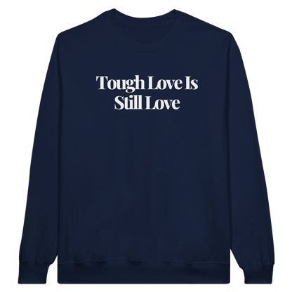Tough Love Is Still Love midweight fleece crewneck sweatshirt in navy with bold text design on front.